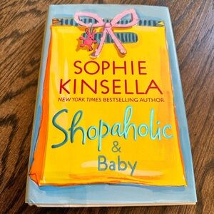 Hardcover book: book club. Confession of Shopaholic Series- Shopaholic & baby